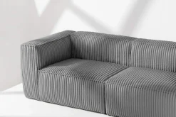 KONSIMO FEROX Nowoczesna sofa trzyosobowa w tkaninie sztruksowej