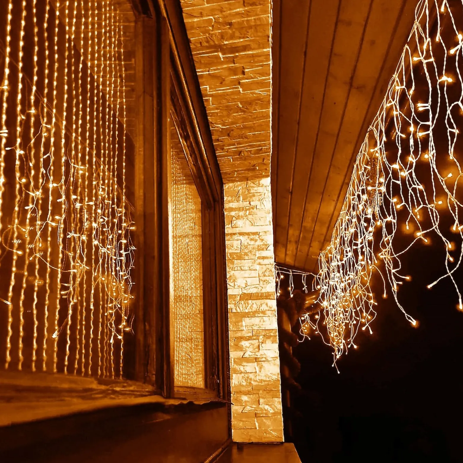 Kurtyna świetlna 200led lampki zewnętrzne sople ciepły biały