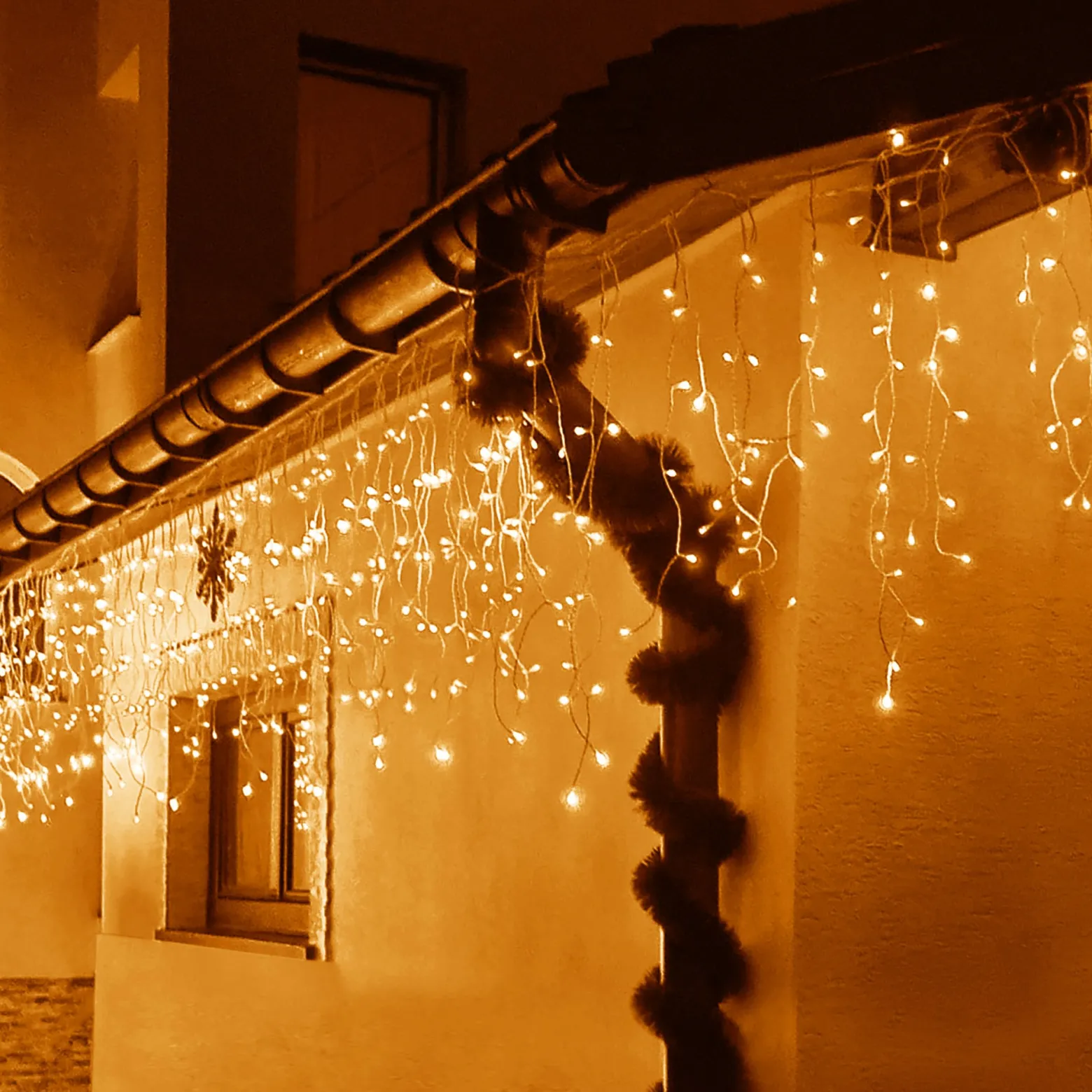 Kurtyna świetlna 200led lampki zewnętrzne sople ciepły biały