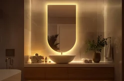 Półowalne nieregularne lustro łazienkowe 40x70 cm LED - ciepłe światło