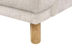 Sofa tapicerowana z drewnianymi nóżkami biała